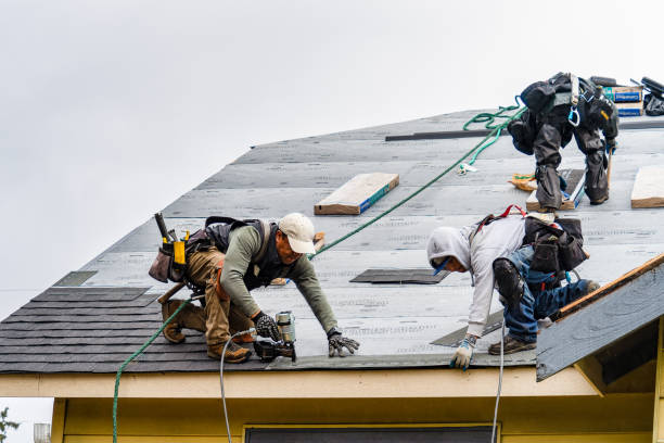 Professional Roofing technician working in Smock, PA